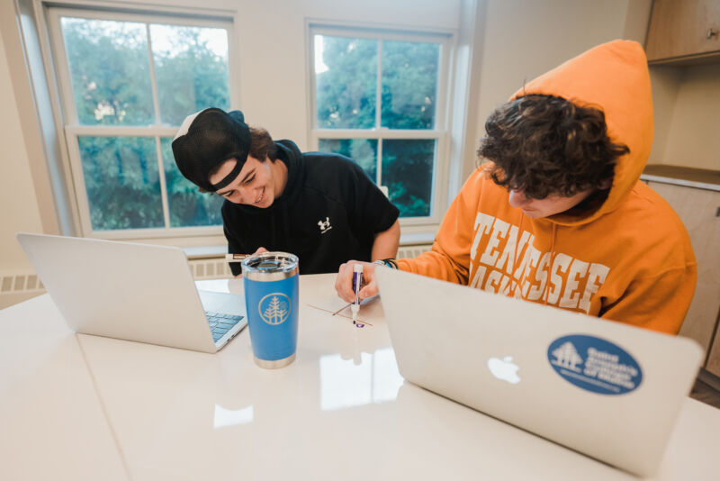 Campus Tuition & Financial Aid 1 students study in a common lounge in St. Joseph Hall
