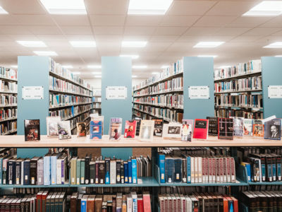 Stack of books at the Wellehan Library
