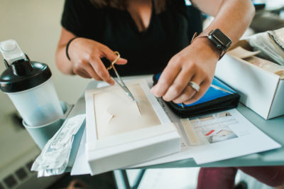 FNP student practices suturing