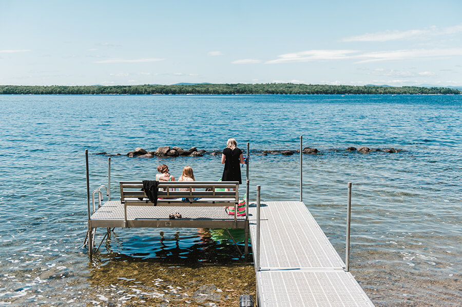 students on the dock during the summer