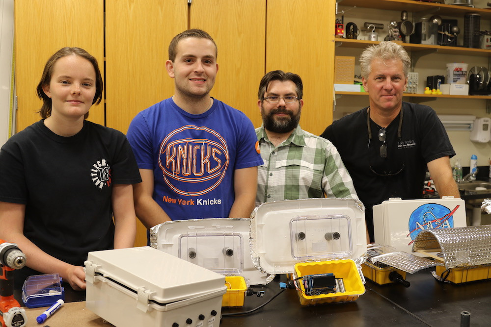 high school students pose with SJC professors Ryan Dorland and Steve Jury