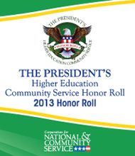 Image of a logo and text, "The President’s Higher Education Community Service Honor Roll, 2013 Honor Roll," with the seal of the Corporation for National & Community Service at the bottom. This recognition highlights colleges contributing significantly to community service initiatives. Saint Joseph's College of Maine