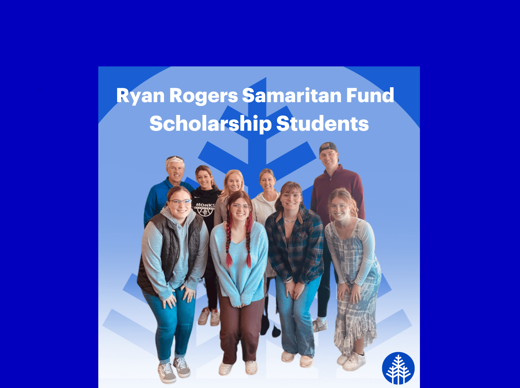 A group of nine students pose and smile in front of a blue background, celebrating the anniversary of the Ryan Rogers Samaritan Fund Scholarship Students. Saint Joseph's College of Maine