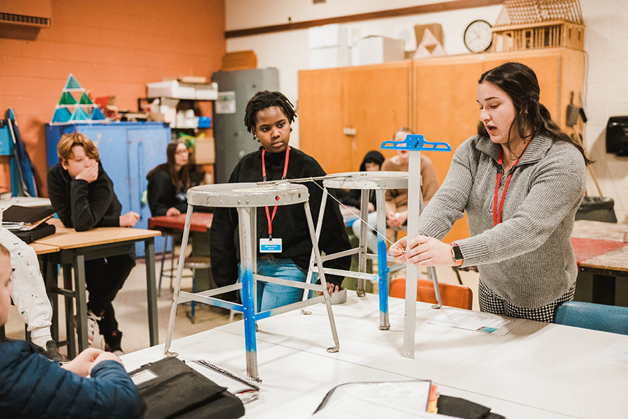 Sophia Viger teaching STEM Ed to middle school students.