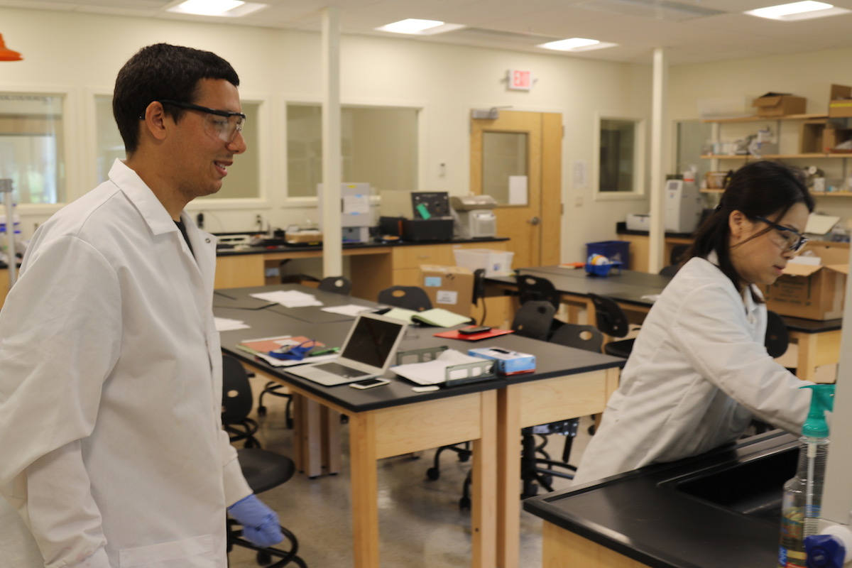 Avery Liotta-Henderson and Dr. Yi Jin Gorske in lab