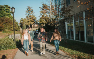 Students walking on campus in Fall