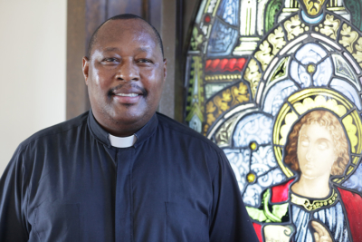 Photo of Father Gabriel in Xavier Hall