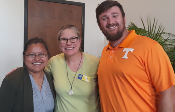 Online students Laura Flores and Kory Frost with program director Carmina Chapp