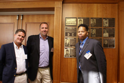 Hall of Fame inductee Charles Warren poses with fellow alumni Matthew Nelson and Thomas Ollman