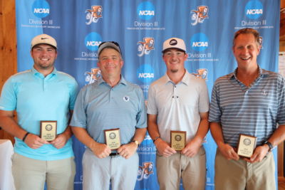 Ryan Godin '17, Jim Caron, Mike Caron, and Dave Larose pose winningly