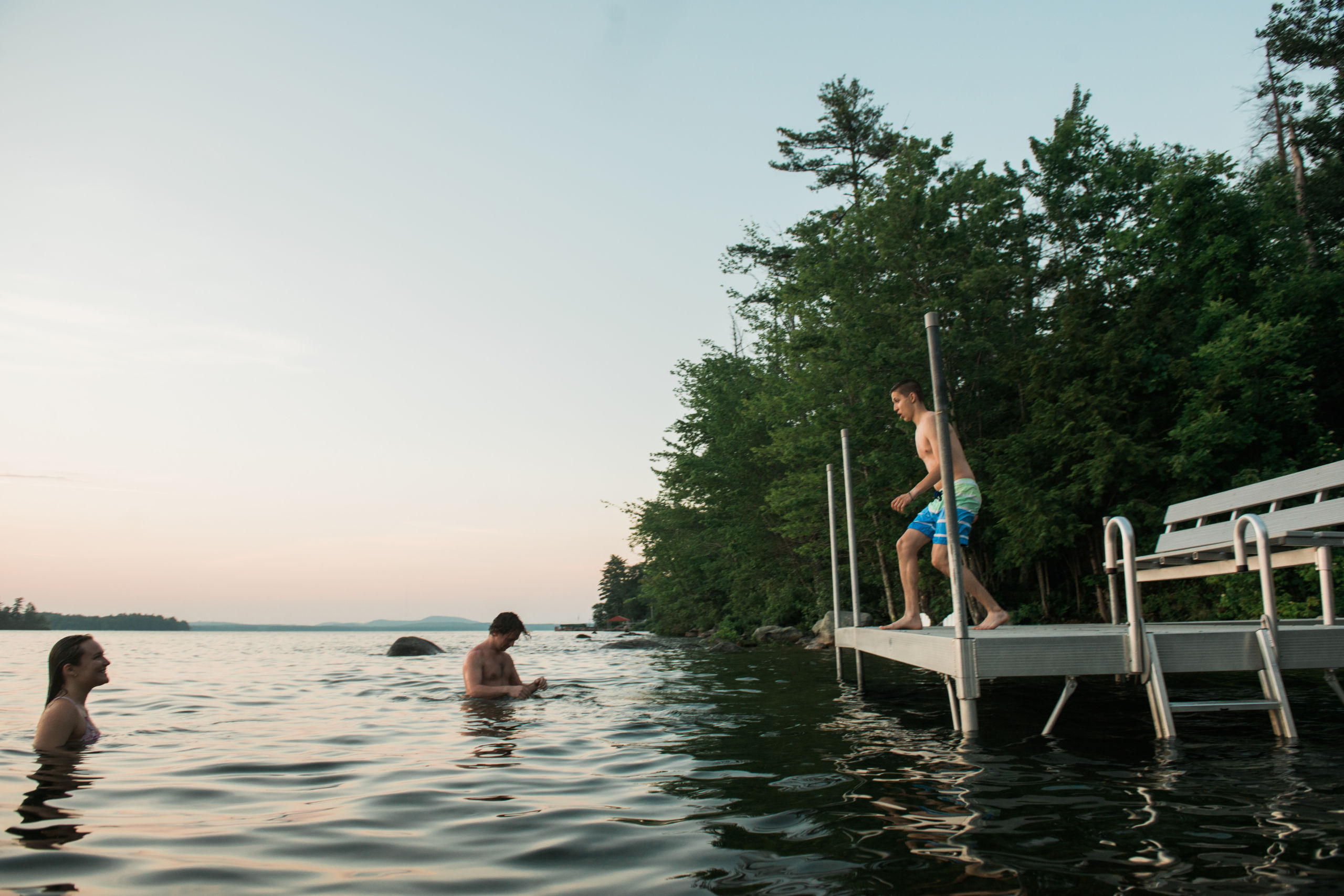 SJC students jump off the dock