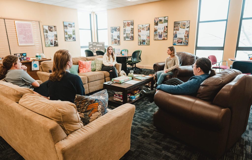 Students hang out in the Mercy Center