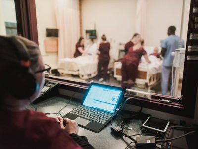 Nursing students practice their skills in the nursing simulation lab