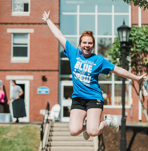 Welcome-Weekend-Block1 Student jumps in the air